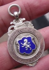 ANTIQUE STERLING SILVER & GOLD ASSCENT WEALDSTONE F.C. 1912-13 FOOTBALL MEDAL.