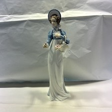 Lladro Figurine “First Rose
