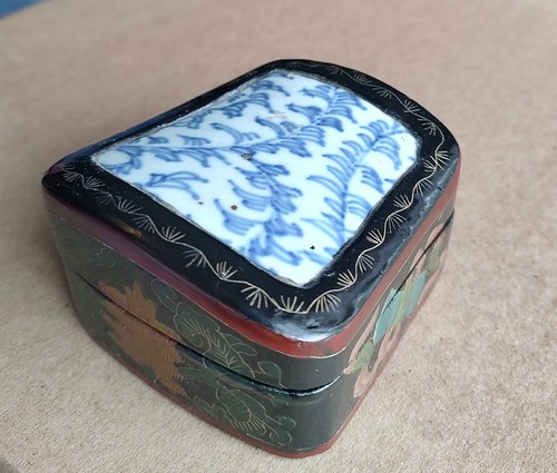 Asian laquered box with - laquered,