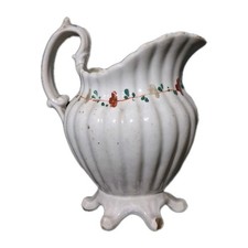antique white ceramic creamer
