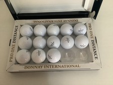 13 DONNAY INTERNATIONAL TITANNIUM GOLF BALLS NEW