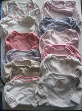 12 x  Various Coloured Girl's Long Sleeved Baby Vests. Age 6 - 9 months.