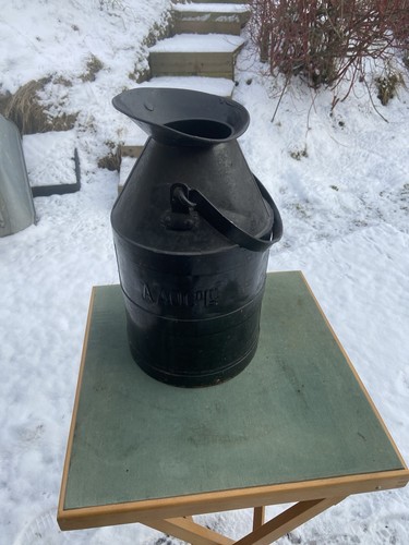 Vintage milk churn automotive - milk,