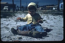 Girl Playing Beach Toy Cars