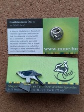 Mme goshawk charity pin - goshawk, badge