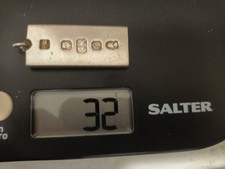 silver medallion hallmarked. 