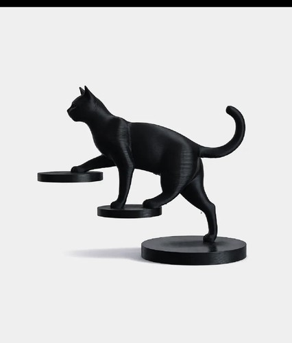 Balancing cat sculpture home - balancing,