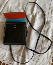 Soft black small crossbody leather bag by brand Graffiti. Multicolour interior