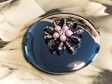 Shiny silver tone jeweled