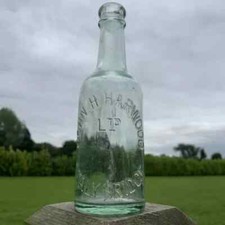 John H Harwood Stalybridge Traditional Old Clear Green Glass Bottle