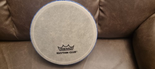 Tiny toy tambourine remo - by,