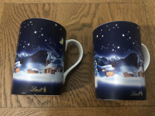 2 x LINDT WINTER SCENE CHOCOLATE/COFFEE MUGS