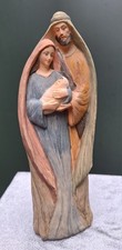 Resin sculpture of the Holy Family, depicting Mary, Joseph, and the baby Jesus
