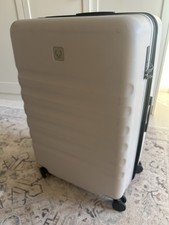 Antler Icon Stripe 4-Wheel Large Hard-Shell Expandable Suitcase Taupe. Used Once