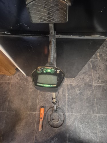 Used metal detector and - and, pin