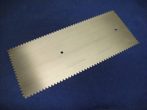 Adhesive notched trowel blade - adhesive,