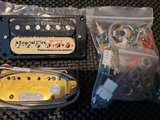Solderless Epiphone Alnico Classic, Double Vacuum Waxed Pickups, Coil Splitting.