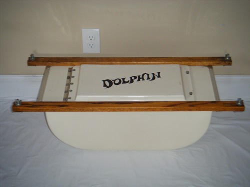 Vintage dolphin canoe boat - "dolphin",