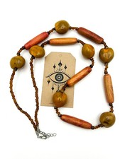 Wood and kukui nut beaded - and,