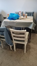 Dining Table And Four Chairs