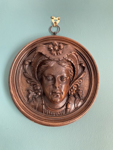 Carved walnut roundel figure - carved,