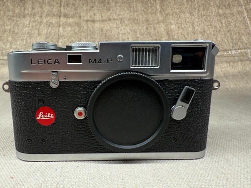 Leica - reduction***),