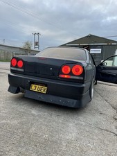 skyline r34 gtt 4 door uras rear bumper