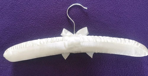 X49 new cream satin padded - new,