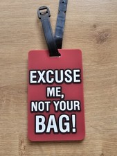 Brown and black luggage tag