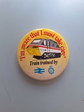 VINTAGE METAL PIN BADGE - BRITISH TRANSPORT POLICE TRAIN TRAINED - 5.5cm round.