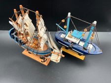 Two small wooden models of