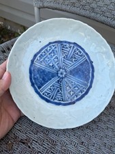 A Chinese Moulded Blue and