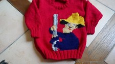CHILD'S HAND KNITTED   FIREMAN