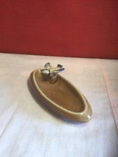 Wade;Bluebird on a pin dish.145mm long.Brown dish;L/brown,Blue&black bird.Ex.con