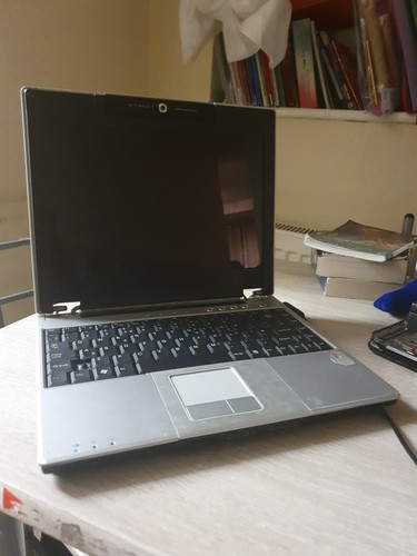 Advent 7078 laptop sold as - (sold,