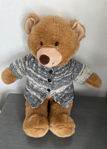 Hand knitted teddy bear - hand,