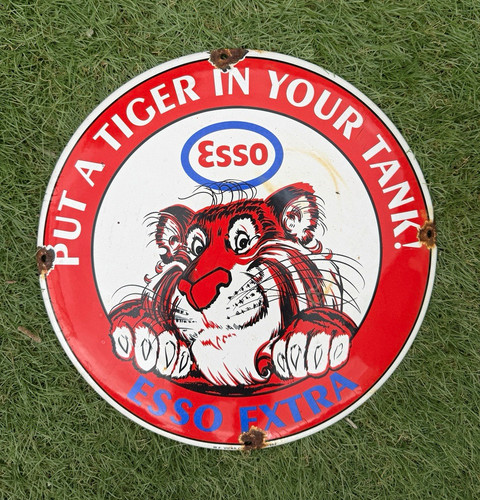 Esso extra put tiger in - “put,