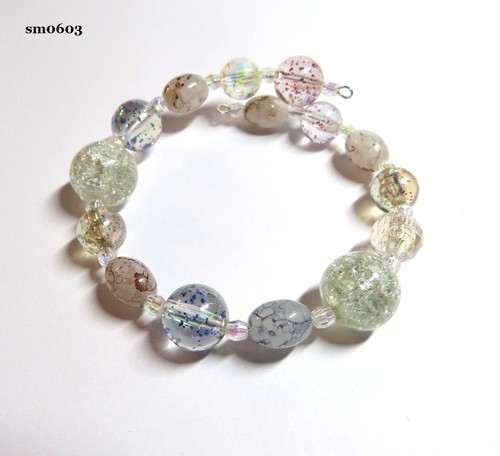 Memory wire bracelet with - a,