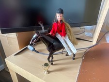 Vintage pippa doll with twisting head and waist arm movement horse rider