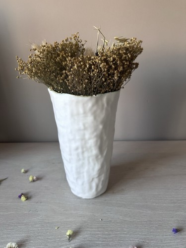 Dimpled vase chipped - dimpled,