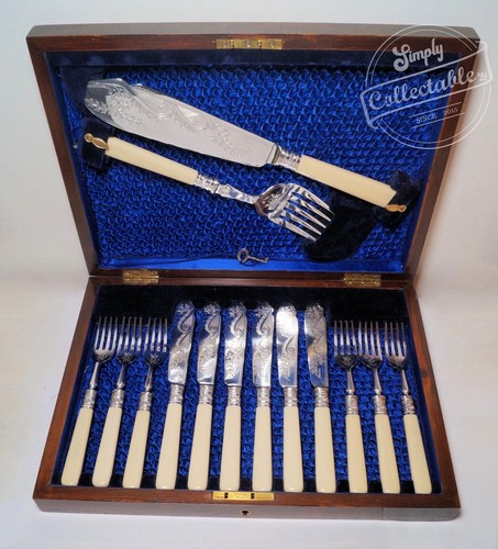 Cased silver plated fish - cased,