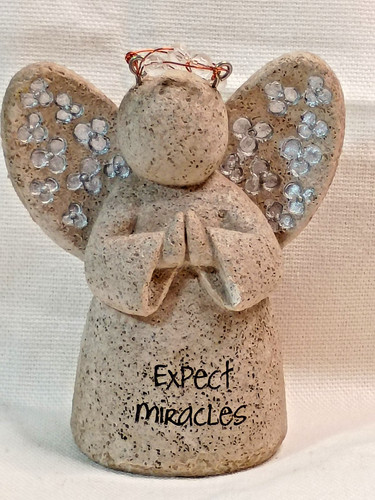 Stone angel figurine expect - angel,