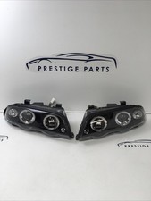 19-04 BMW E46 Headlight Coupe