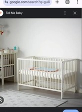 IKEA Gulliver white cot bed (several mattress protectors, sheets included)