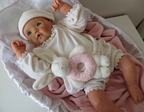 One kind clay baby doll - kind,