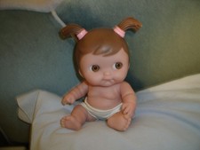 unusual  BERENGUER BABY DOLL WITH PIGTAILS HB 9.5" ANATOMICALLY CORRECT BORN?