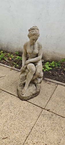 Classic seated nude figure