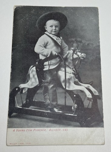 Antique cow puncher - puncher, cowboy