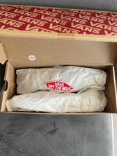Men’s white slip on vans