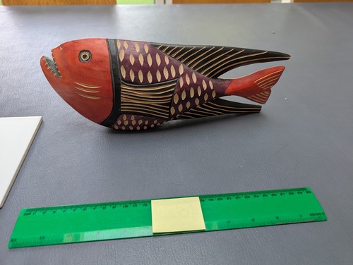 Hand carved wooden piranha - hand,